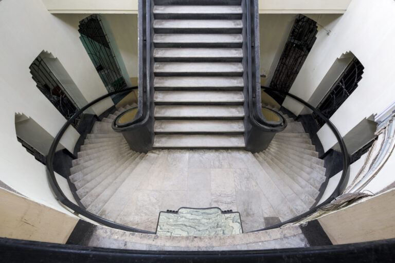 A spiral staircase seen from above in a Kolkata heritage building
