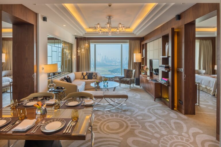 Luxury hotel suite living room with city views
