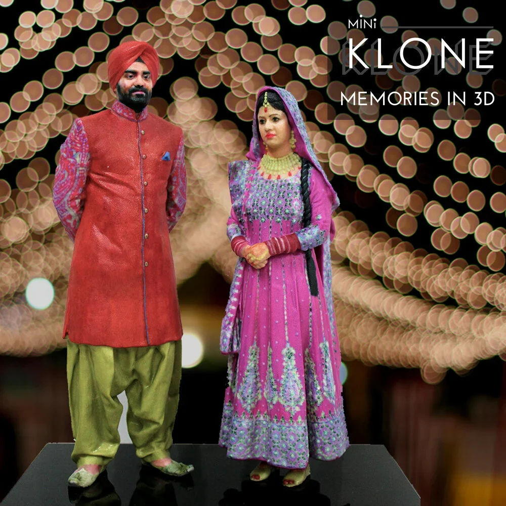 Mini Klone of a couple in traditional Punjabi wedding outfits