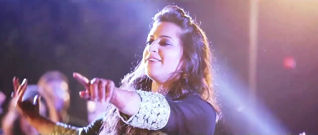 Dancing under the lights at a sangeet